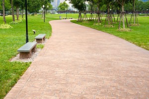park with decorative concrete walkway
